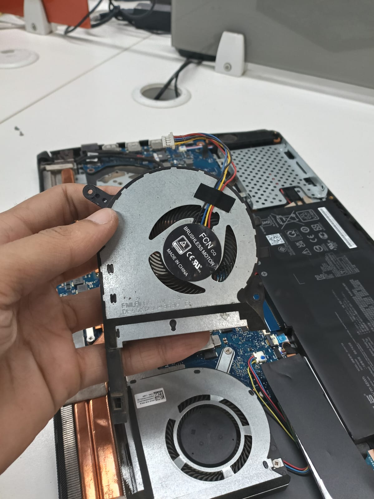 Laptop Cooling Fan Replacement In Progress
